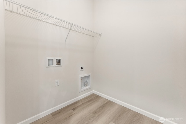 5781 SW Thornhill Ave SW Unit 324, Port Orchard, WA 98367 - laundry area featuring electric dryer hookup, washer hookup, and light wood finished floors