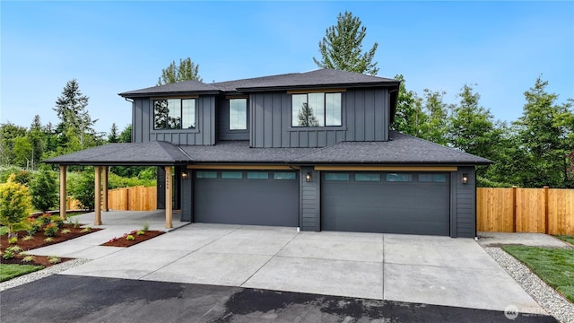 30408 SE 304th St, Auburn, WA 98038 - view of front of house with board and batten siding, a garage, and concrete driveway
