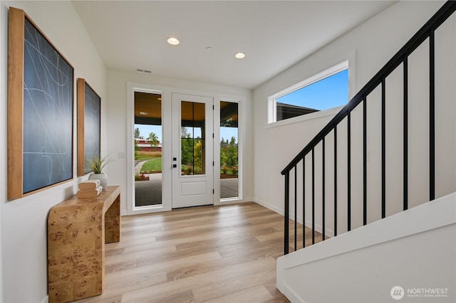30408 SE 304th St, Auburn, WA 98038 - entrance foyer featuring recessed lighting, wood finished floors, and stairway