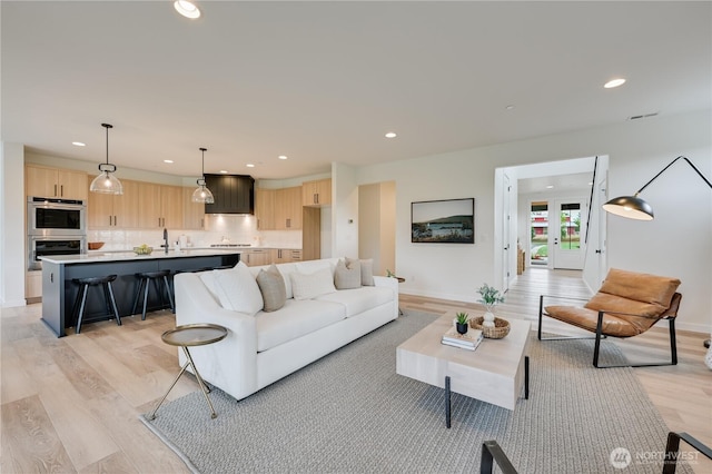 30408 SE 304th St, Auburn, WA 98038 - living room with light wood-type flooring and recessed lighting