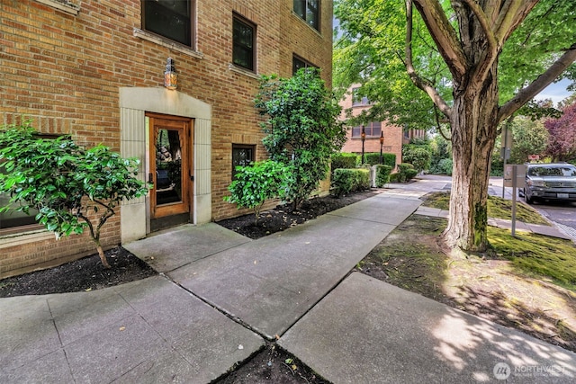 519 W Roy St Unit 211, Seattle, WA 98119 - doorway to property with brick siding