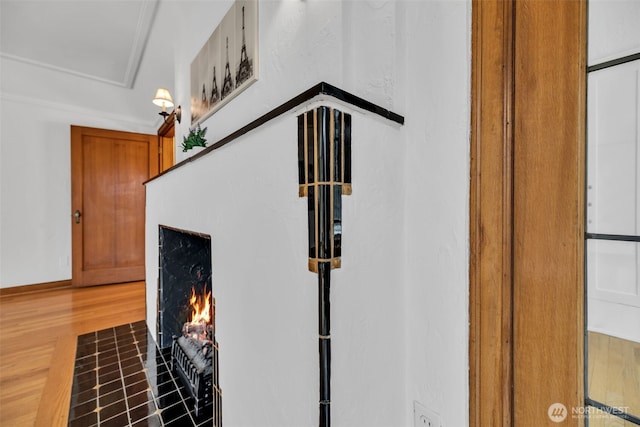 519 W Roy St Unit 211, Seattle, WA 98119 - detailed view of a fireplace with flush hearth and wood finished floors