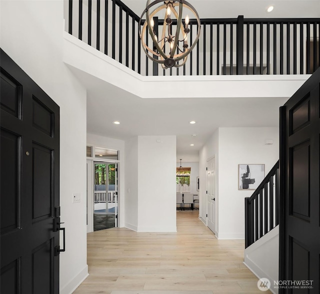 16432 SE 24th St, Bellevue, WA 98008 - entrance foyer with a chandelier, plenty of natural light, light wood-style flooring, stairs, and recessed lighting