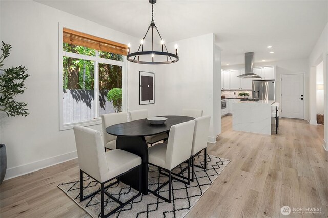 16432 SE 24th St, Bellevue, WA 98008 - dining space featuring light wood-style flooring, a chandelier, and recessed lighting