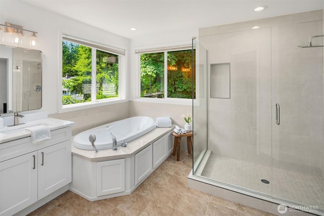 16432 SE 24th St, Bellevue, WA 98008 - bathroom featuring a stall shower, vanity, a garden tub, and recessed lighting