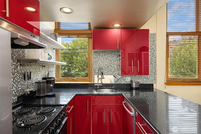 842 Washington St Unit 204, Port Townsend, WA 98368 - kitchen with red cabinets, range with electric cooktop, dishwasher, backsplash, and recessed lighting