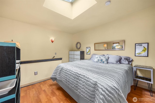 842 Washington St Unit 204, Port Townsend, WA 98368 - bedroom featuring wood finished floors and a skylight