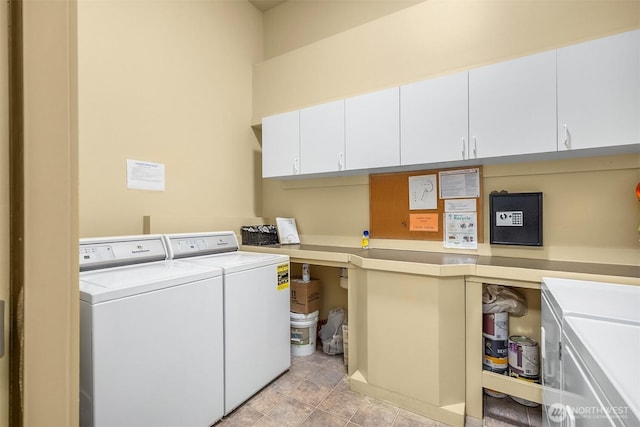 842 Washington St Unit 204, Port Townsend, WA 98368 - washroom with washer and clothes dryer and cabinet space