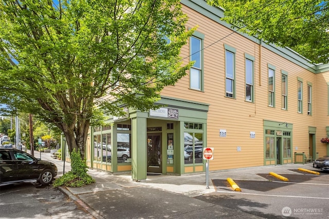 842 Washington St Unit 204, Port Townsend, WA 98368 - view of property featuring uncovered parking