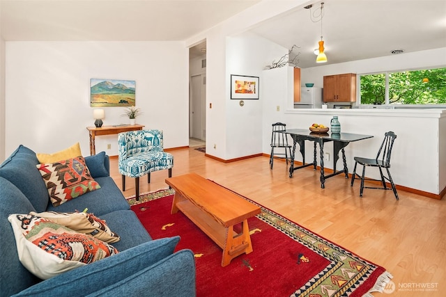 9922 SW 206th Ct, Vashon, WA 98070 - living room featuring wood finished floors and lofted ceiling
