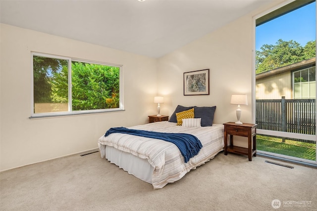 9922 SW 206th Ct, Vashon, WA 98070 - carpeted bedroom featuring access to outside and baseboards