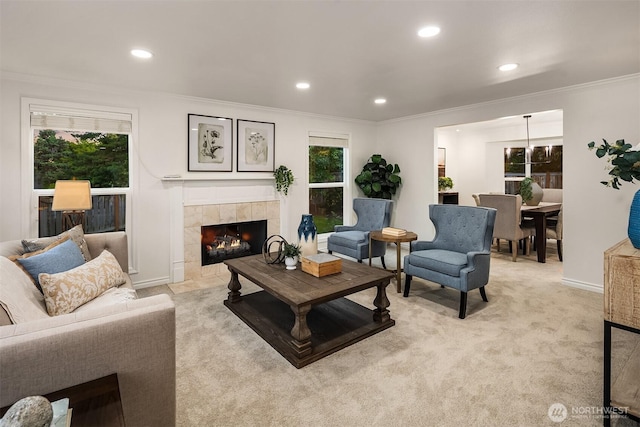 12810 SE 22nd Pl, Bellevue, WA 98005 - living room featuring ornamental molding, recessed lighting, light colored carpet, and a tile fireplace