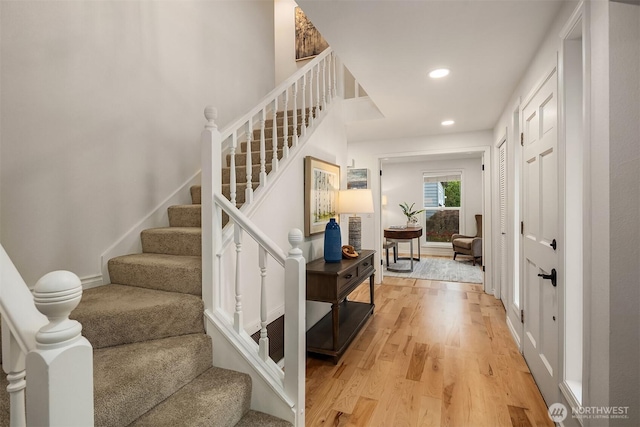 12810 SE 22nd Pl, Bellevue, WA 98005 - stairs featuring wood finished floors and recessed lighting