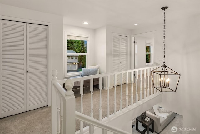 12810 SE 22nd Pl, Bellevue, WA 98005 - hall with carpet, recessed lighting, and a chandelier