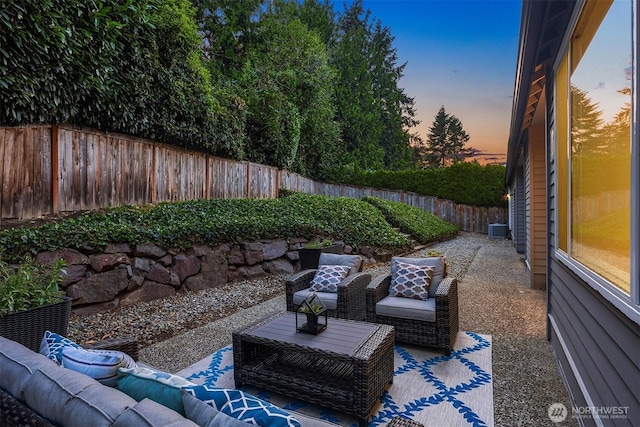12810 SE 22nd Pl, Bellevue, WA 98005 - fenced backyard with an outdoor hangout area and a patio area