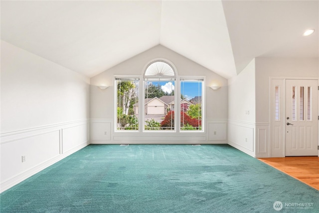 2804 18th St SE, Puyallup, WA 98374 - empty room featuring a wainscoted wall, carpet, and lofted ceiling
