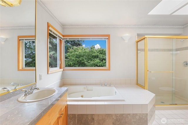 2804 18th St SE, Puyallup, WA 98374 - full bath featuring a whirlpool tub, vanity, a shower stall, ornamental molding, and tile patterned floors