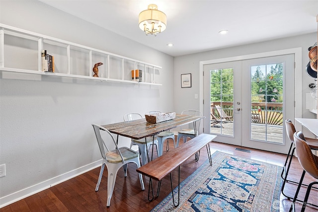 6511 Canyon Ct SW, Olympia, WA 98512 - dining space with french doors, wood finished floors, recessed lighting, and a chandelier