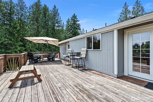 6511 Canyon Ct SW, Olympia, WA 98512 - wooden terrace with outdoor dining area