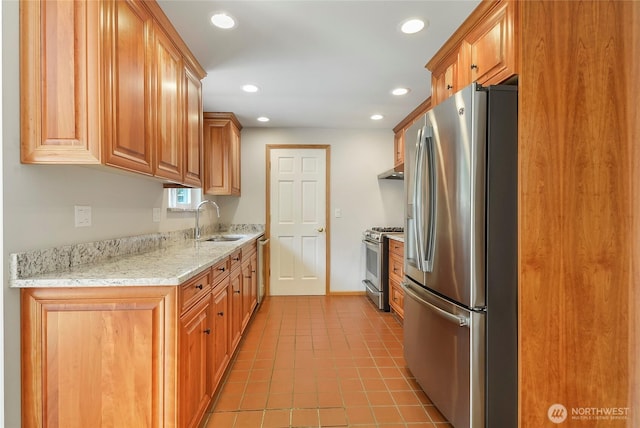 832 Birch St, Edmonds, WA 98020 - kitchen featuring appliances with stainless steel finishes, recessed lighting, under cabinet range hood, light tile patterned floors, and light stone counters