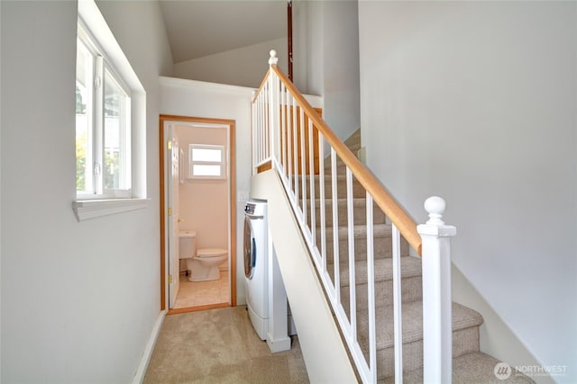 832 Birch St, Edmonds, WA 98020 - staircase with carpet floors, washer / clothes dryer, and lofted ceiling
