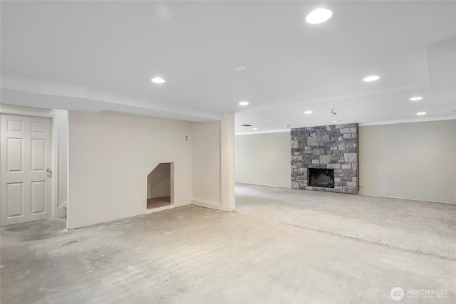 832 Birch St, Edmonds, WA 98020 - finished basement featuring ornamental molding, recessed lighting, and a stone fireplace