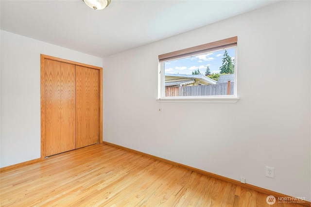 832 Birch St, Edmonds, WA 98020 - unfurnished bedroom featuring a closet and wood finished floors