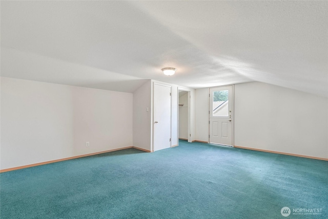 832 Birch St, Edmonds, WA 98020 - bonus room with vaulted ceiling, carpet flooring, and a textured ceiling