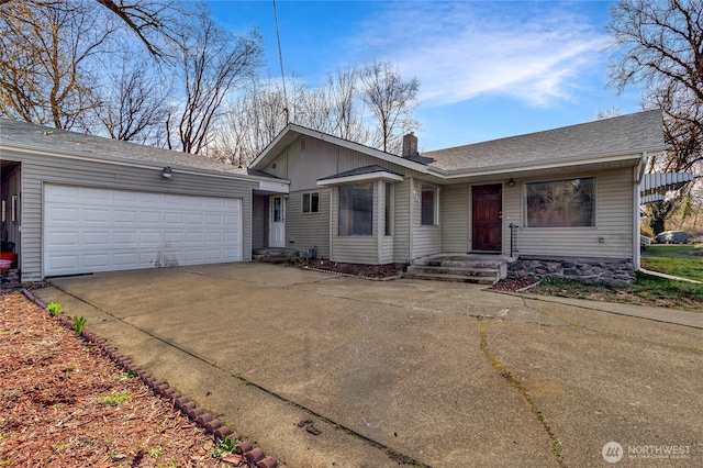 913 Woodlawn, Walla Walla, WA 99362 - view of front of house featuring driveway, a chimney, a garage, and a shingled roof