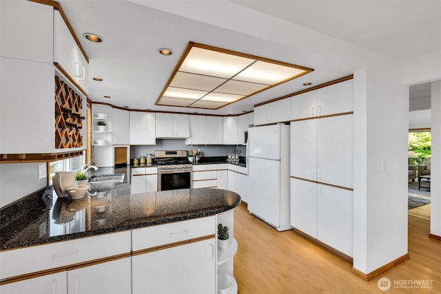 14007 65th Pl W, Edmonds, WA 98026 - kitchen featuring freestanding refrigerator, open shelves, stainless steel range with gas stovetop, light wood finished floors, and recessed lighting