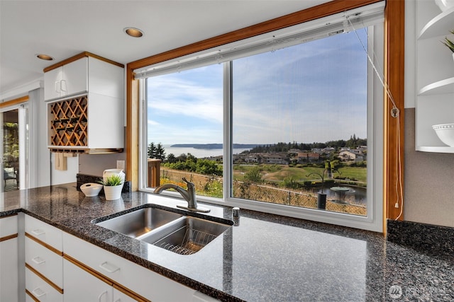 14007 65th Pl W, Edmonds, WA 98026 - kitchen with plenty of natural light, white cabinets, dark stone countertops, and recessed lighting