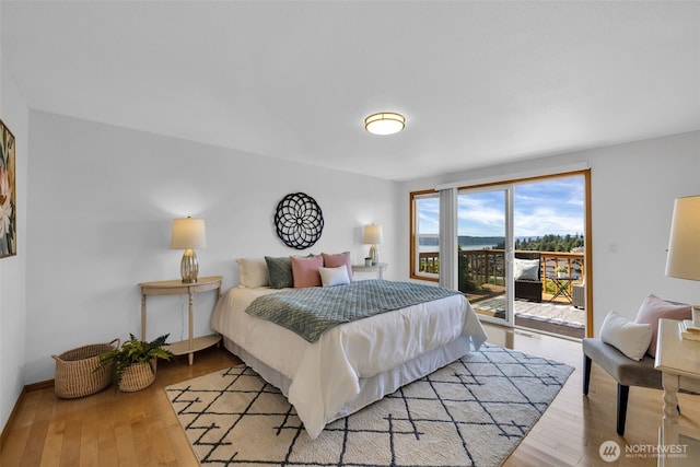 14007 65th Pl W, Edmonds, WA 98026 - bedroom featuring access to exterior and wood finished floors