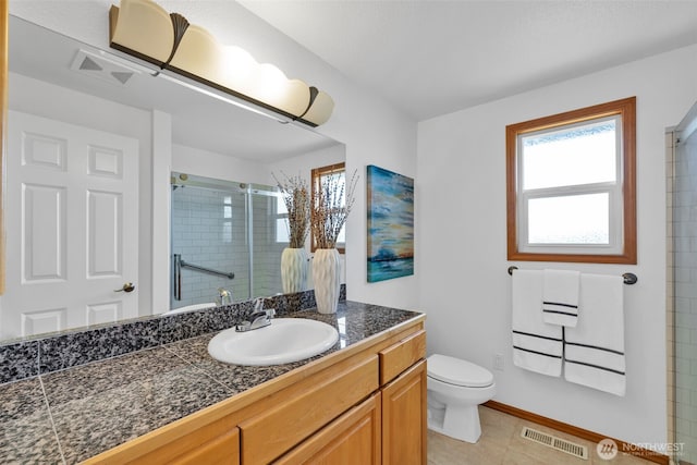 14007 65th Pl W, Edmonds, WA 98026 - full bathroom featuring vanity, a stall shower, and tile patterned flooring
