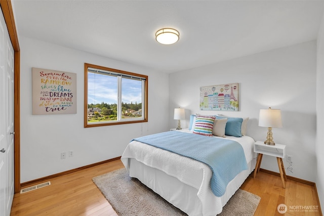 14007 65th Pl W, Edmonds, WA 98026 - bedroom with light wood-type flooring and baseboards
