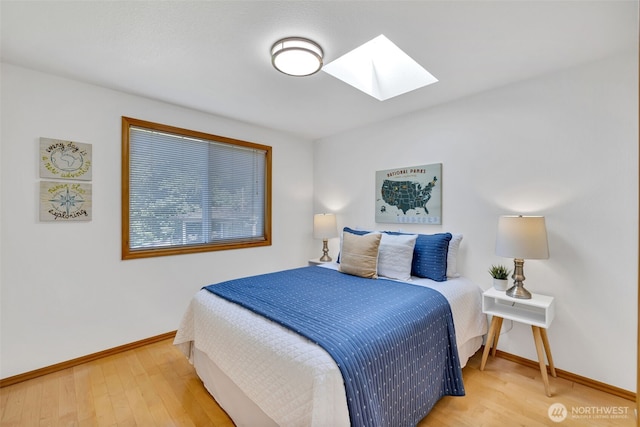 14007 65th Pl W, Edmonds, WA 98026 - bedroom with a skylight and wood finished floors