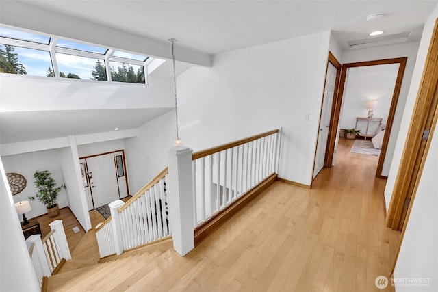 14007 65th Pl W, Edmonds, WA 98026 - corridor featuring an upstairs landing, light wood finished floors, beamed ceiling, high vaulted ceiling, and recessed lighting