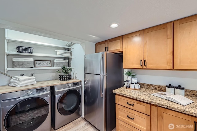 12200 100th Ave NE Unit N-D, Kirkland, WA 98034 - laundry area with washer and dryer, light wood finished floors, and recessed lighting