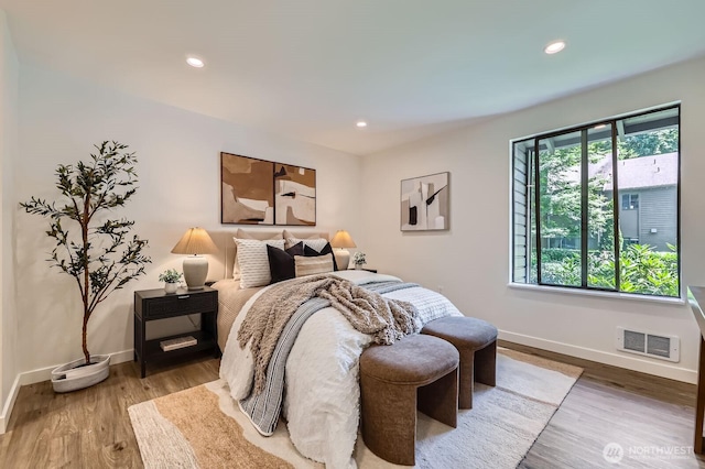 12200 100th Ave NE Unit N-D, Kirkland, WA 98034 - bedroom featuring light wood finished floors and recessed lighting