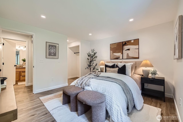 12200 100th Ave NE Unit N-D, Kirkland, WA 98034 - bedroom with light wood finished floors and recessed lighting
