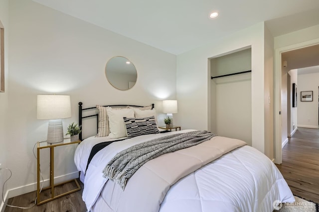 12200 100th Ave NE Unit N-D, Kirkland, WA 98034 - bedroom featuring wood finished floors, a closet, and recessed lighting