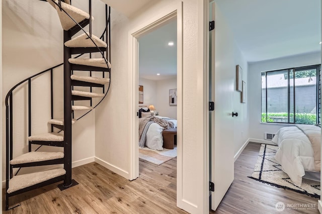 12200 100th Ave NE Unit N-D, Kirkland, WA 98034 - stairs featuring wood finished floors and baseboards