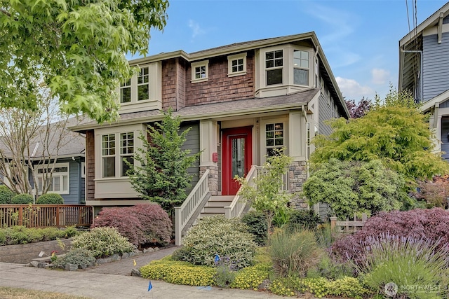 2611 9th Ave W, Seattle, WA 98119 - view of front of house with roof with shingles and stone siding