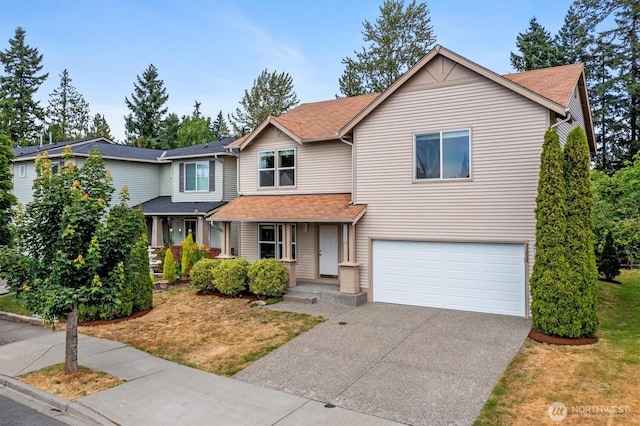 33036 42nd Ave S, Federal Way, WA 98001 - view of front of house with an attached garage, concrete driveway, and roof with shingles