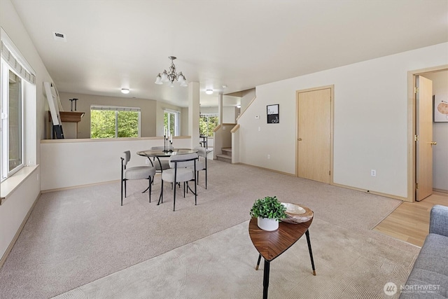 33036 42nd Ave S, Federal Way, WA 98001 - dining space with a chandelier, stairway, and light carpet