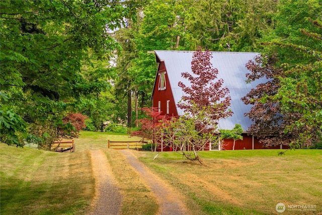 36 Seven Sisters Rd, Port Ludlow, WA 98365 - view of green lawn featuring a barn and an outdoor structure