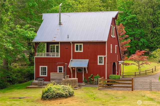 36 Seven Sisters Rd, Port Ludlow, WA 98365 - back of house featuring a metal roof