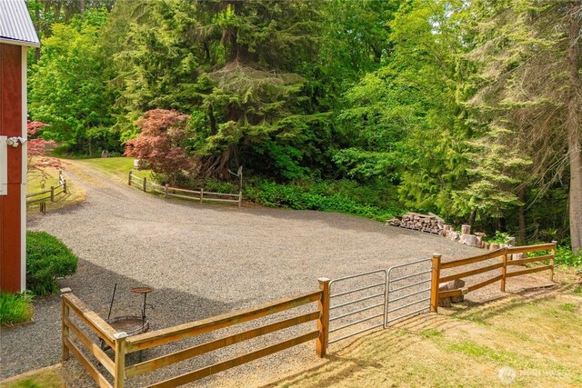36 Seven Sisters Rd, Port Ludlow, WA 98365 - view of yard with a view of trees