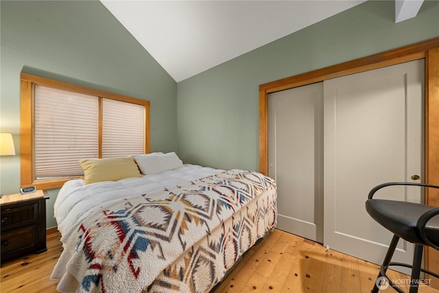 36 Seven Sisters Rd, Port Ludlow, WA 98365 - bedroom with hardwood / wood-style floors, lofted ceiling, and a closet
