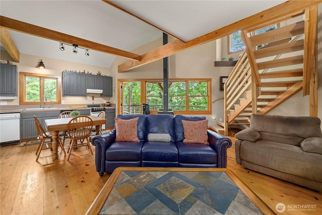 36 Seven Sisters Rd, Port Ludlow, WA 98365 - living area featuring light wood-type flooring and stairway