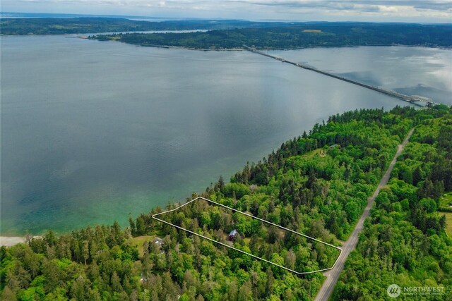 36 Seven Sisters Rd, Port Ludlow, WA 98365 - aerial view of property and surrounding area featuring a nearby body of water and property parcel outlined